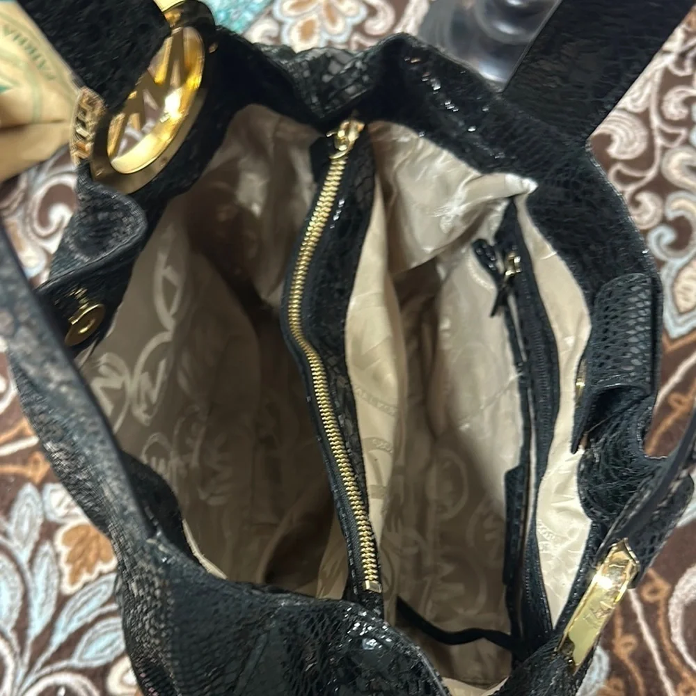 Michael Kors Black Hobo Bag with Gold Emblem